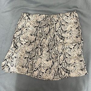 New Robbie printed silk-charmeuse mini skirt | Reformation